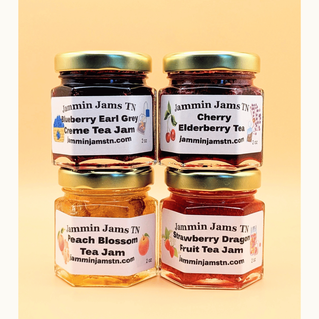 
                  
                    Four jars of Jammin Jams TN jam on a beige background
                  
                